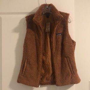Brand new with tags - Patagonia vest. 2 front pockets - ultra soft women Medium